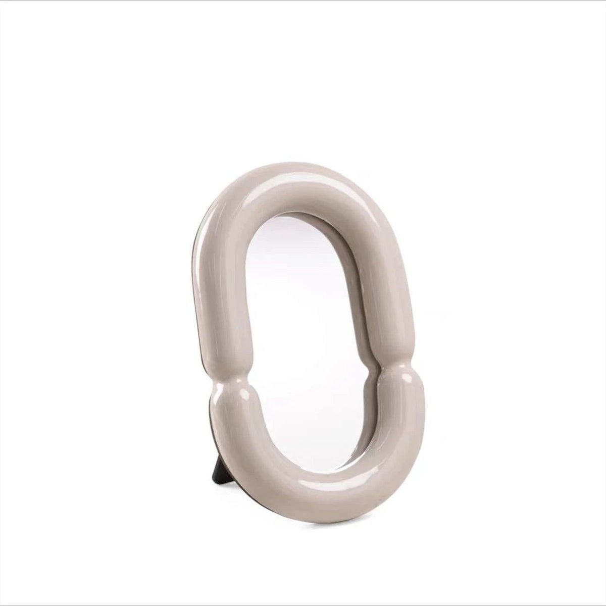 Elegant Oval Mirror with Sculptural Shape