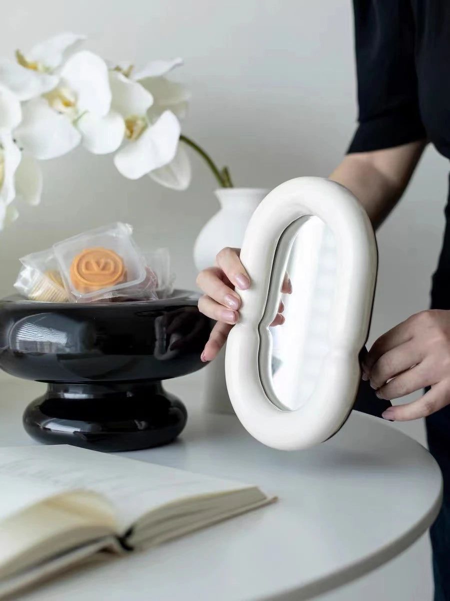 Elegant Oval Mirror with Sculptural Shape