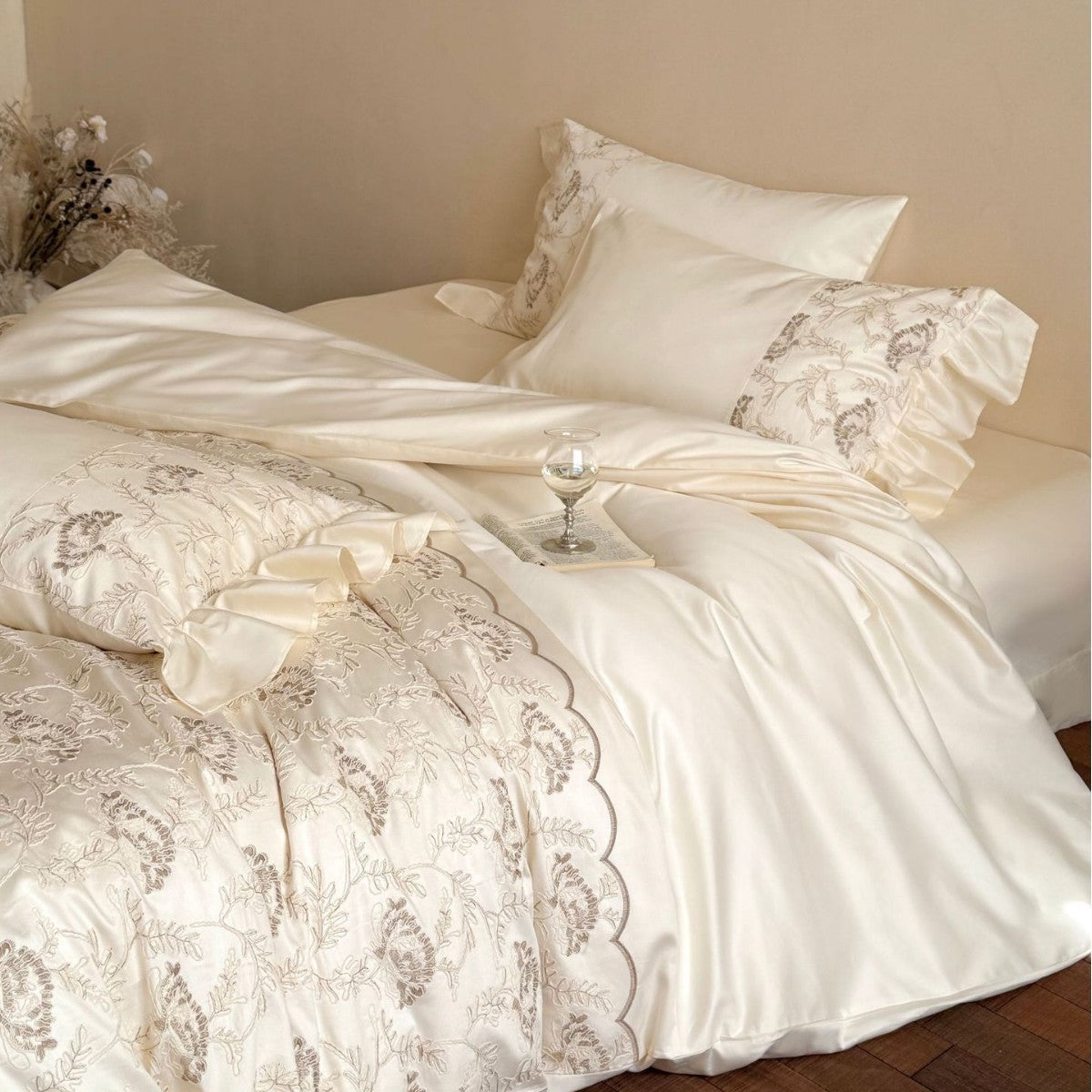 Floral Embroidered Quilt with Satin Ruffles and Decorative Piping